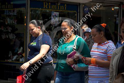 Pedestrians on a walking street in San Jose, Costa Rica.