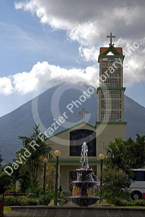 La Fortuna Church and Arenal Volcano at the town of La Fortuna, San Carlos, Costa Rica.