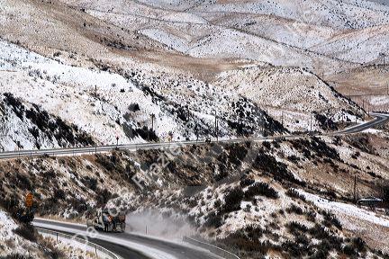 Winter weather driving on icy roads in the foothills near Boise, Idaho, USA.