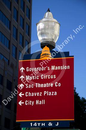 Street sign providing tourist information and direction in Sacramento, California, USA.
