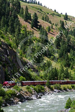 The Thunder Mountain Line scenic tourist train traveling along the Payette River between Horseshoe Bend and Banks, Idaho, USA.