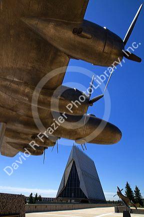 Bronze sculpure of vintage WW11 aircraft in front of the Cadet Chapel at the Air Force Academy in Colorado Springs, Colorado, USA.
