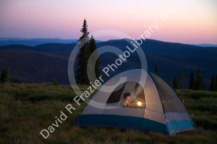 Tent camping at the summit of Green Mountain along the historic Magruder Corridor road that devides the Frannk Church-River of No Return Wilderness Area and the Selway-Bitterwoot Wilderness in Idaho, USA.