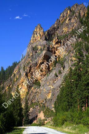 Road passing through Painted Rocks State Park in the Bitterroot National Forest near Darby, Montana, USA.