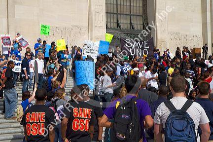 Demonstrators protest educational funding cuts on the steps of the state capitol building in Baton Rouge, Louisiana, USA.
