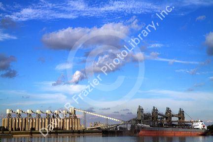 Bulk freighter at a grain shipping terminal on the Mississippi River at the Port of Baton Rouge, Louisiana, USA.