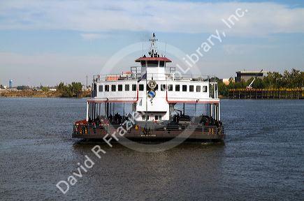 A car ferry boat on the Mississippi River at New Orleans, Louisiana, USA.