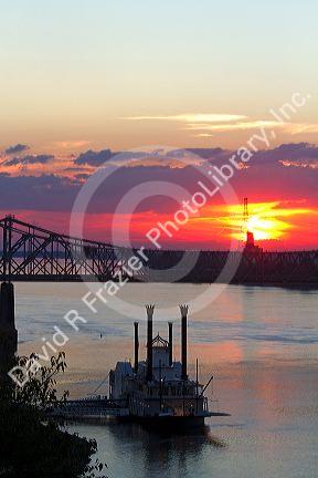 Sunset with steamboat under the Natchez-Vidalia Bridges spanning the Mississippi River between Vidalia, Louisiana and Natchez, Mississippi, USA.