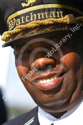 Watchman crew member of the SS. Natchez steamboat on the Mississippi River at New Orleans, Louisiana, USA.