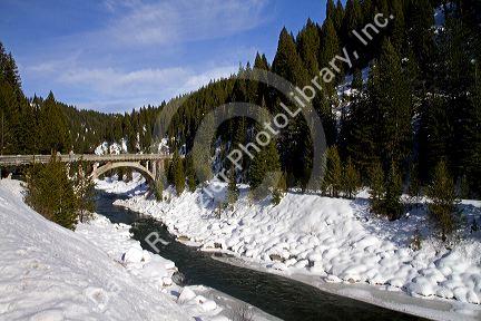 The Rainbow Bridge spanning the North Fork of the Payette River during winter, Valley County, Idaho, USA.