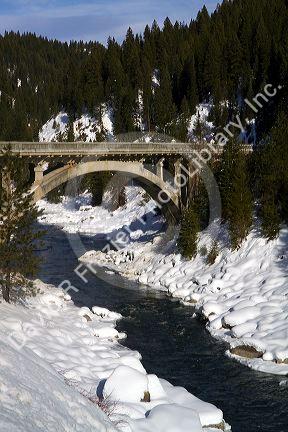 The Rainbow Bridge spanning the North Fork of the Payette River during winter, Valley County, Idaho, USA.