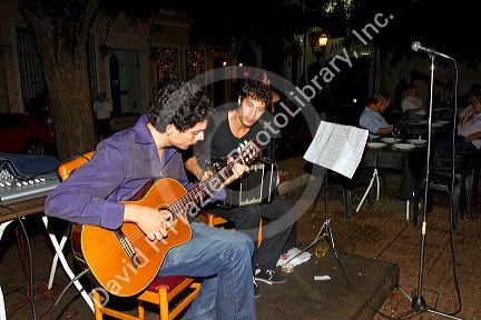 Street musicians at Plaza Dorrego in the San Telmo barrio of Buenos Aires, Argentina.
