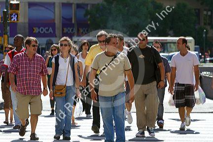 Pedestrians on Avenida 9 de Julio in Buenos Aires, Argentina.