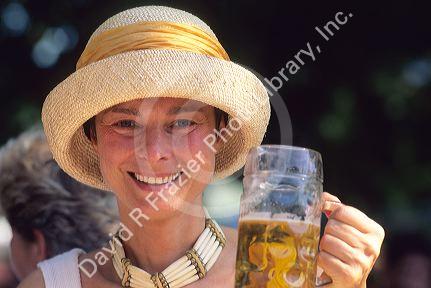 German woman drinking beer.