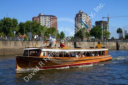 Vintage mohogany motorboat on the Parana Delta at Tigre, Argentina.