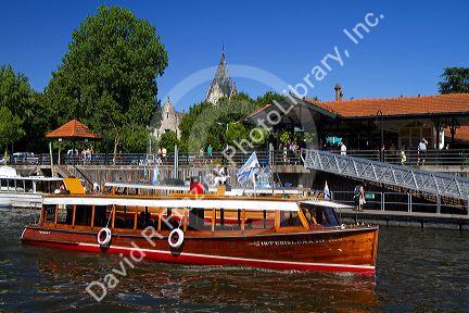 Vintage mohogany motorboat on the Parana Delta at Tigre, Argentina.