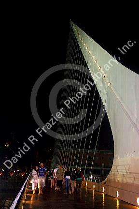 The Puente de la Mujer footbridge at night in the Puerto Madero district of Buenos Aires, Argentina.
