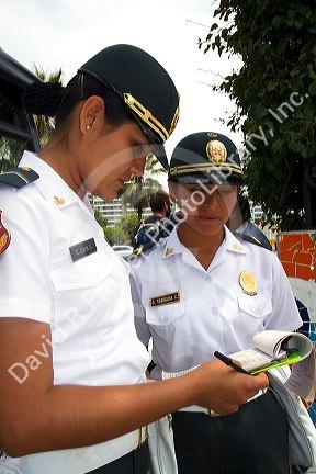 Female peruvian police officers in Lima, Peru.