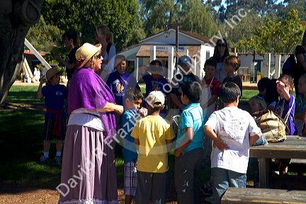 Children on a guided tour of Old Town San Diego State Historic Park, California, USA.