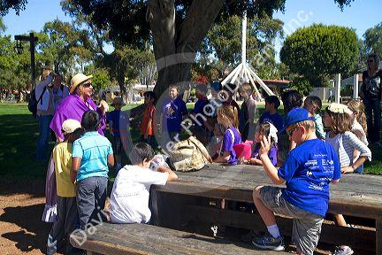 Children on a guided tour of Old Town San Diego State Historic Park, California, USA.