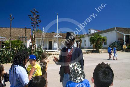 Children on a guided tour of Old Town San Diego State Historic Park, California, USA.