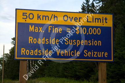 Road sign warning of large fine for speeding along highway 17 near Thunder Bay, Ontario, Canda.