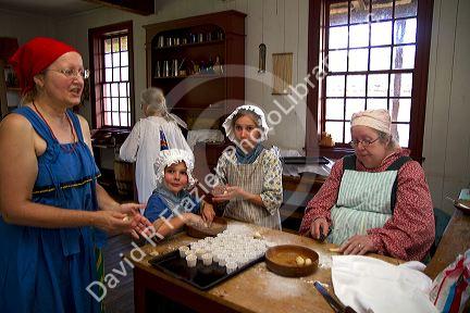 People participate in a rendezvous re-enactment at the Grand Portage National Monument on the north shore of Lake Superior in northeastern Minnesota, USA.