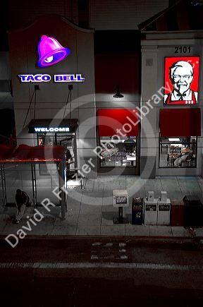 Fast food restaurant combination of Taco Bell and Kentucky Fried Chicken on Lombard Street in San Francisco, California, USA.