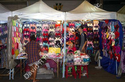Street vendor selling womens undergarments in Bangkok, Thailand, USA.