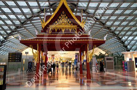 Thai architecture in the terminal at the Suvarnabhumi Airport also known as the New Bangkok International Airport in Bangkok, Thailand.