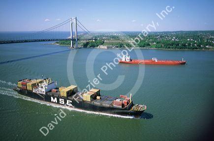 A container ship entering New York Harbor, New York.
