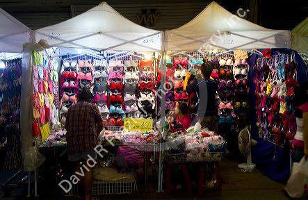Street vendor selling womens undergarments in Bangkok, Thailand, USA.