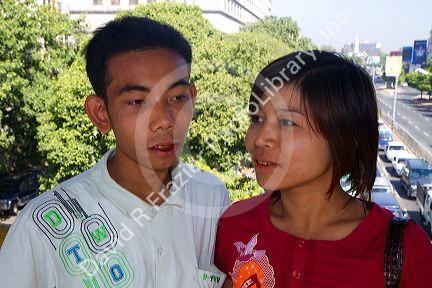 Burmese couple in (Rangoon) Yangon, (Burma) Myanmar.