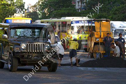 Road construction on the street in (Rangoon) Yangon, (Burma) Myanmar.