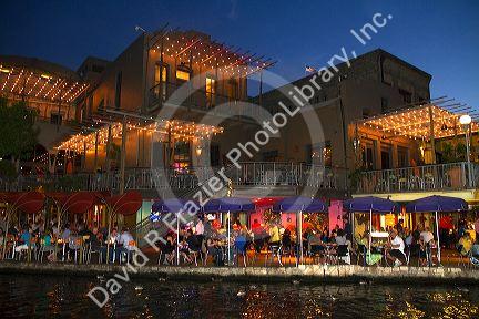 Outdoor dining along the River Walk in San Antonio, Texas, USA.