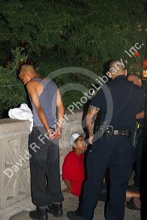 Police arrest suspects along the River Walk in San Antonio, Texas, USA.