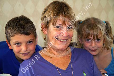 Grandmother visiting with her grand children in Tampa, Florida, USA.