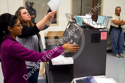Ballot scanners tabulating voting results on election day in Boise, Idaho, USA.