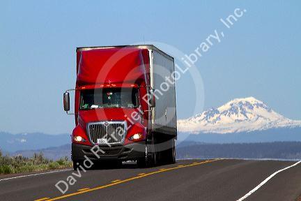 Semi truck traveling on U.S. Route 20 east of Bend, Oregon, USA.