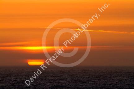 Sunset on the pacific ocean at Newport, Oregon, USA.