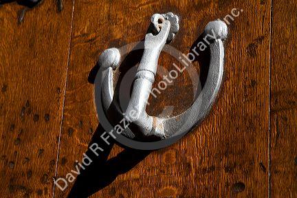 Door knocker at Puente La Reina a Basque town along the Way of St. James pilgrimage route, Navarra, Spain.