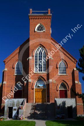 Native clay brick exterior of the St. Ignatius Mission located in St. Ignatius, Montana, USA.