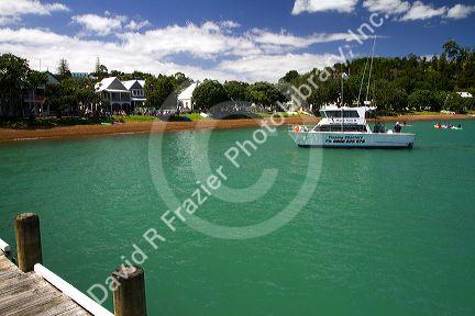 Fishing charter boat on the Bay of Islands at the waterfront town of Russell, North Island, New Zealand.