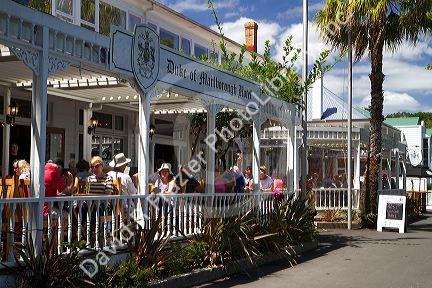 Patio dining at a restaurant in the waterfront town of Russell on the Bay of Islands, North Island, New Zealand.