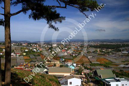 View of greenhouses used to grow plants and vegetables for domestic and export consumption in the Da Lat basin, Vietnam.
