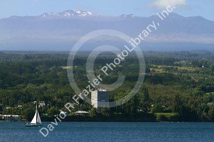 View of the shore and Mauna Kea volcano on Hilo, Hawaii, USA.