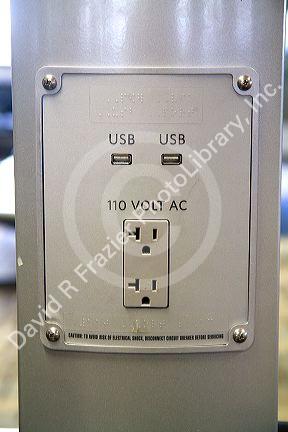 Phone and personal device charging station at the Minneapolis Saint Paul International airport located in Hennepin County, Minnesota, USA.