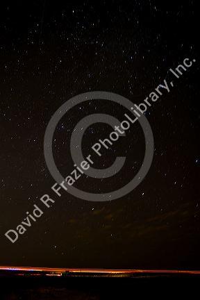 The night sky with stars and highway traffic in Ada County, Idaho, USA.