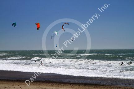 Kitesurfing in the Pacific Ocean along Highway 1 near Santa Cruz, Californina, USA.