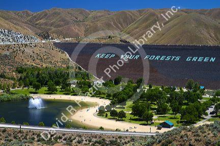 Face of the Lucky Peak Dam and Sandy Point Park on the Boise River near Boise, Idaho, USA.